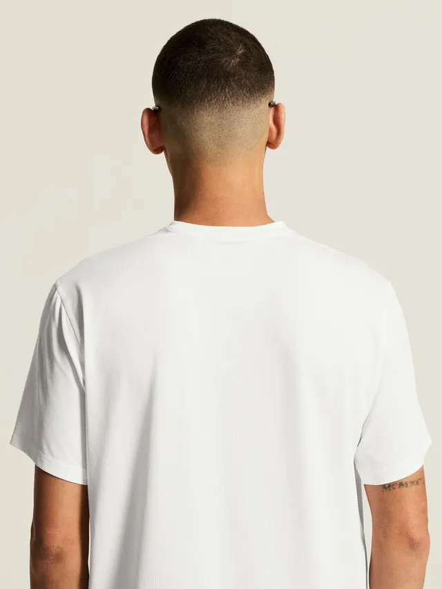 Craft Herre Trøye SS Essence Logo 2 M Myk funksjonell treningstrøye - White 