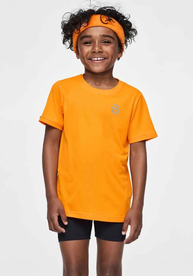 Dæhlie Junior T-skjorte Primary 140 Lett treningstrøye Orange Popsicle 